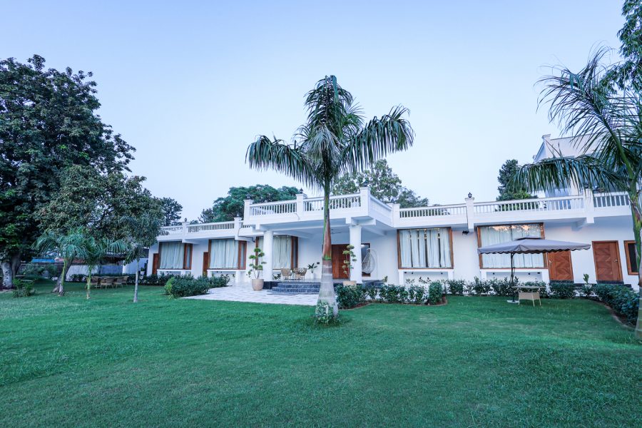5 BHK Farmhouse with Pool, Lush Green Lawn & More